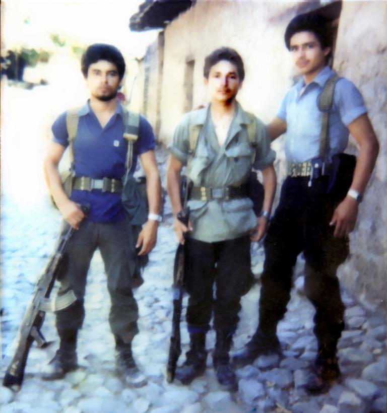 Alfredo’s brother, Rigoberto, in the middle was killed during the war.
